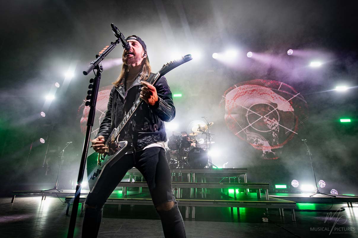 Bullet for My Valentine guitarist performing live on stage